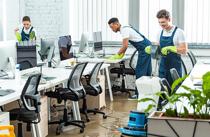 Workers are cleaning commercial space