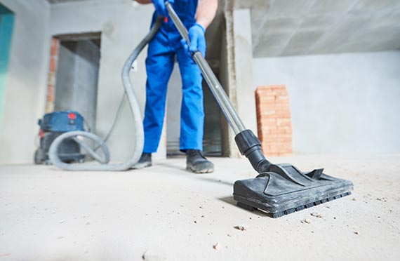 construction cleaning service dust removal with vacuum cleaner
