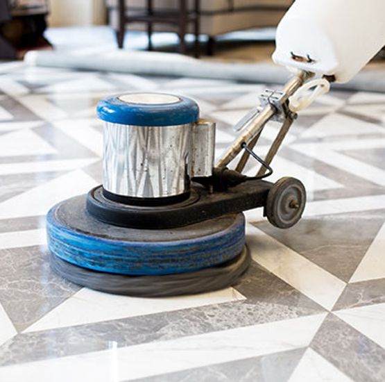 Professional stripping and polishing services for marble floors using specialized equipment