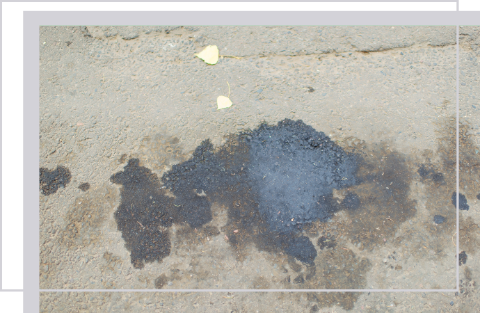 Visible grease build-up on commercial floor needing cleaning