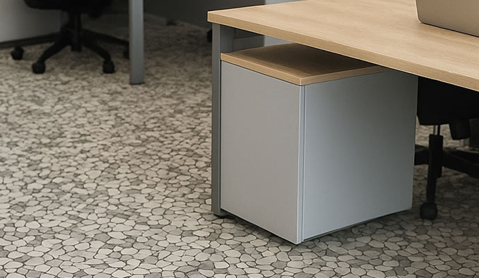 A close-up of a modern office with unique grey and white stone flooring