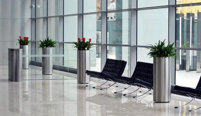 Beautiful commercial seating area with shiny polished tile flooring