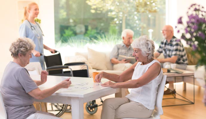 Senior citizens sitting on a hospital area  