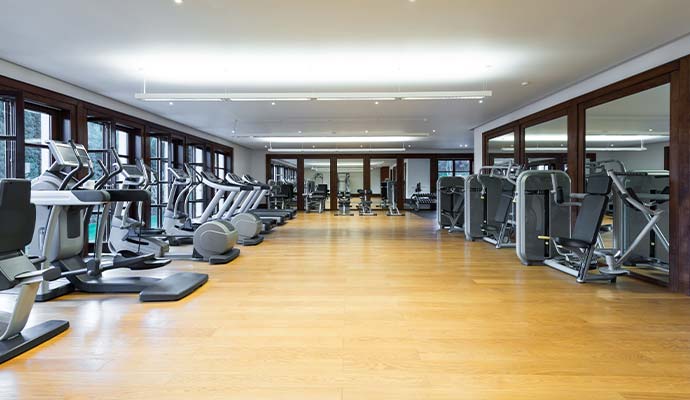 Clean fitness center interior with equipment