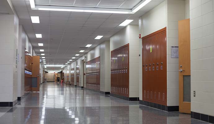 Clean school hallway lined with student lockers
