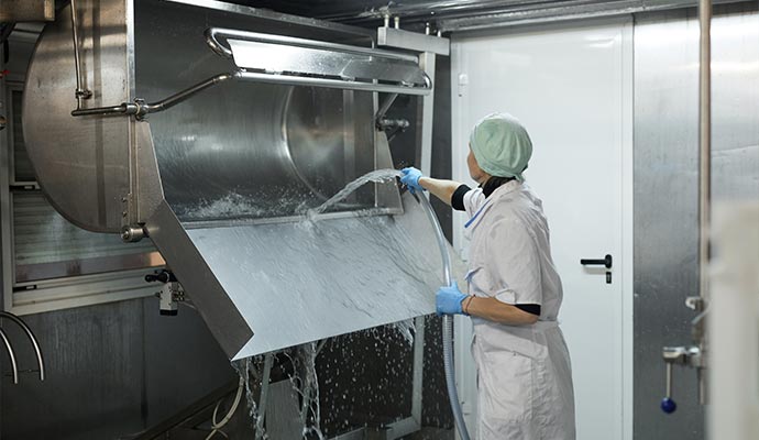 A professional cleaning industrial food processing equipment