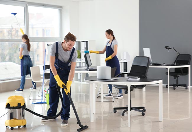 team of janitors commercial cleaning office