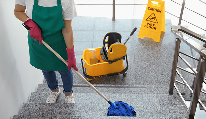 woman cleaning stairs