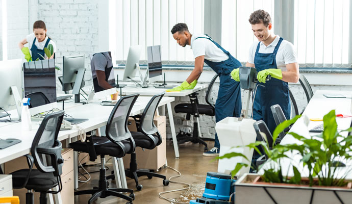 worker cleaning office space